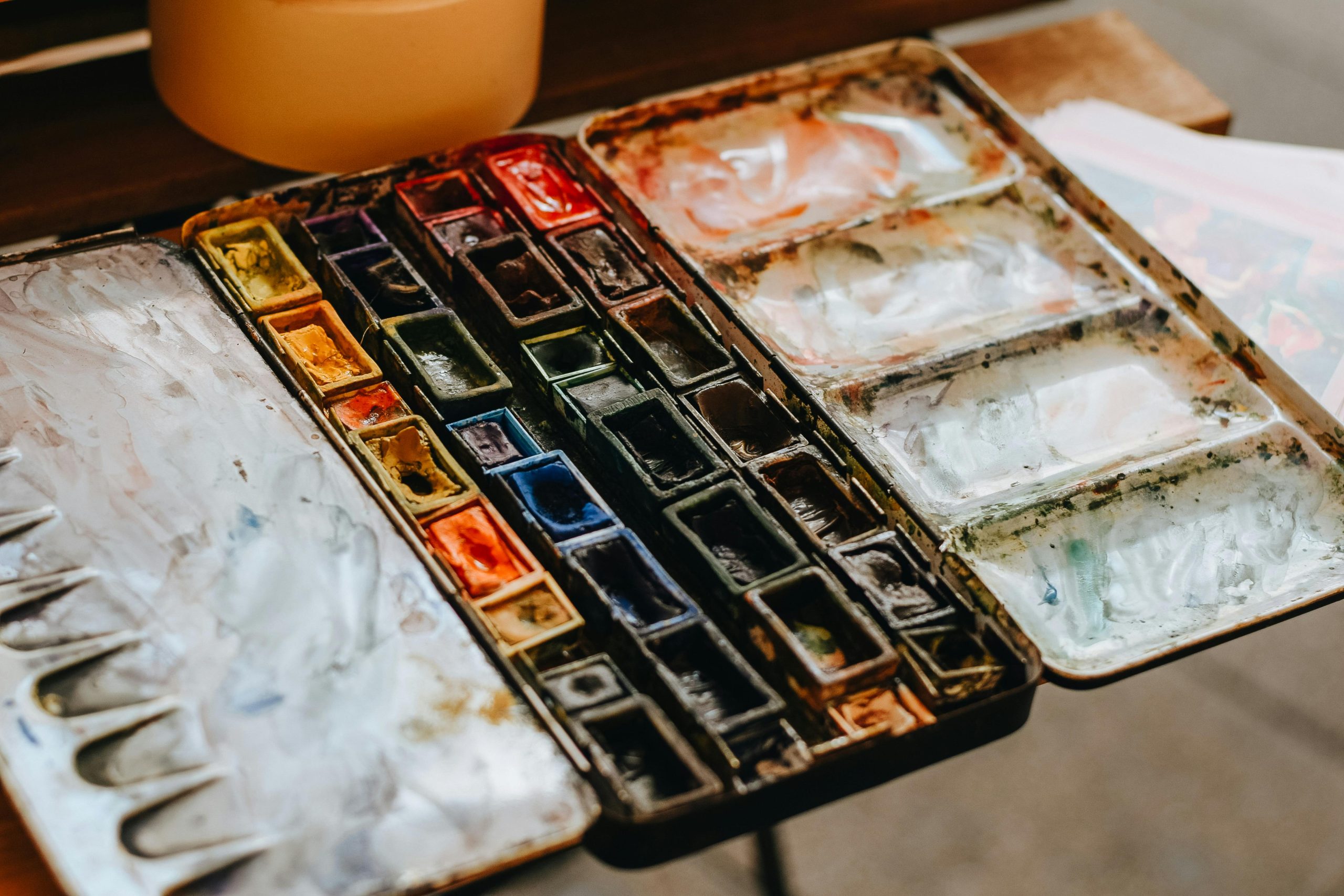 A vibrant watercolor paint set with various hues, perfect for artistic inspiration.